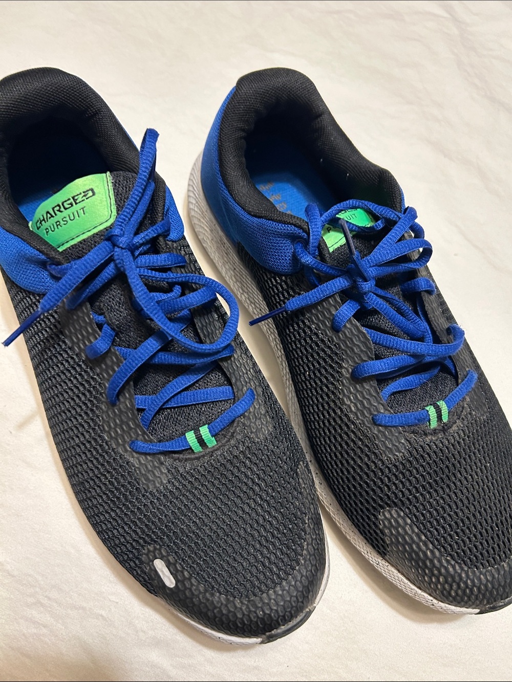 Under Armour Black and Blue Charged Pursuit Athletic Shoes
